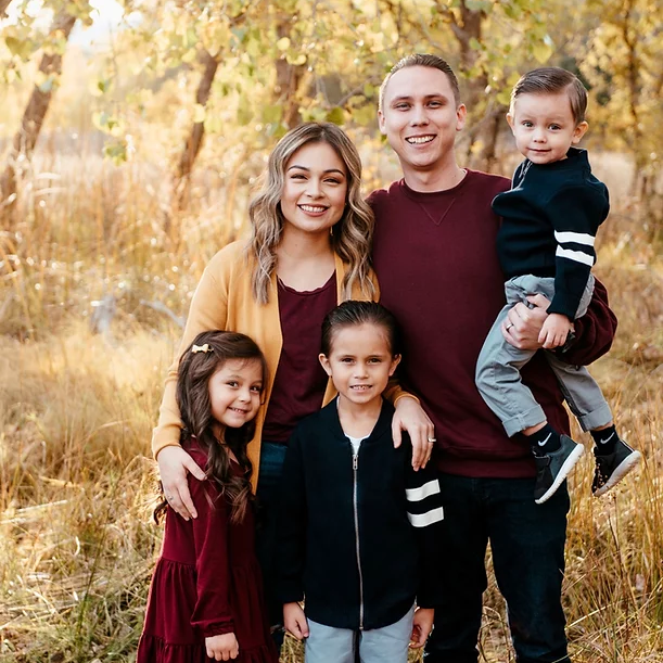 Travis DeLuna & Family